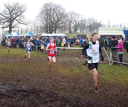 Connor running through the mud